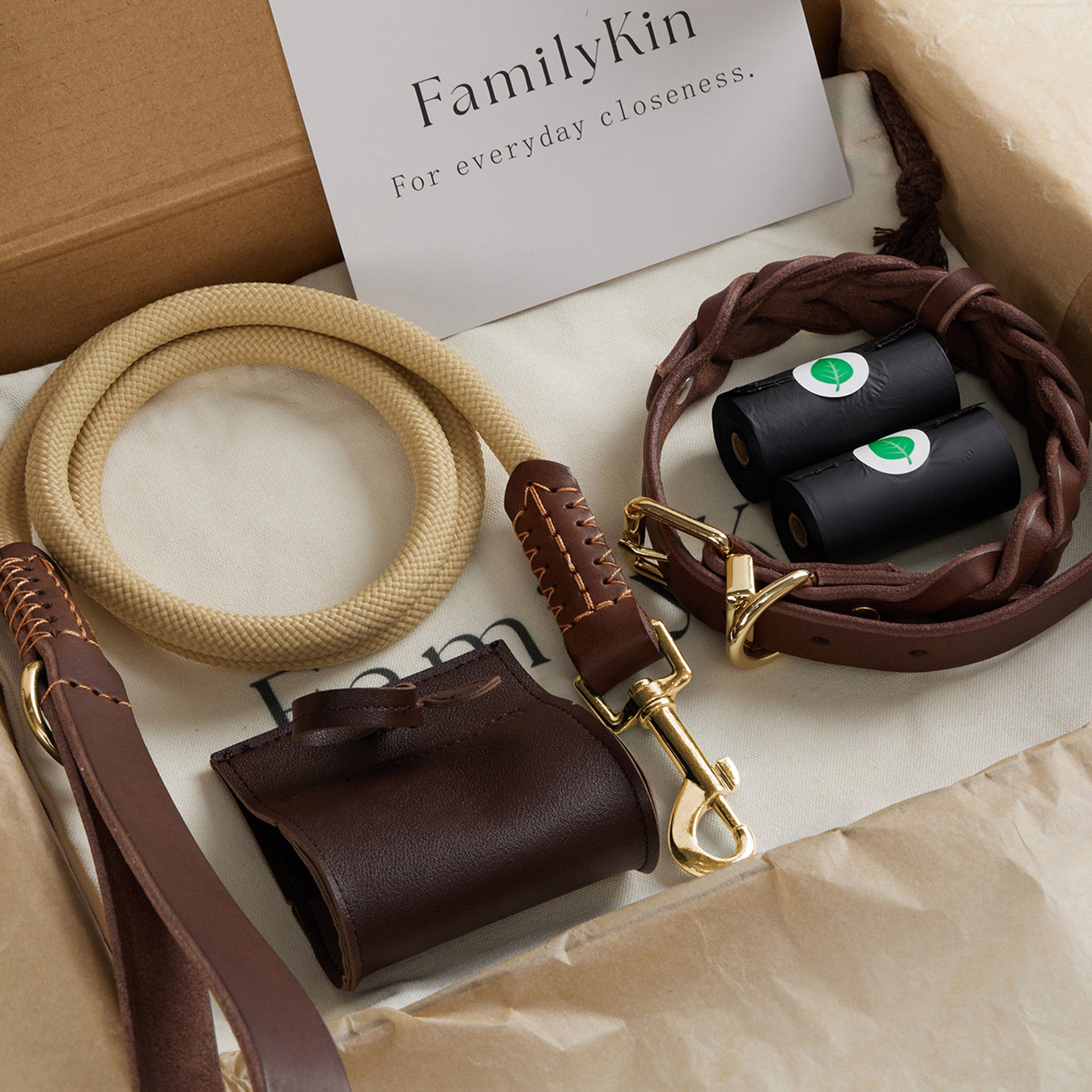 Everyday Walk Set with braided leather collar, walk leash, waste bag dispenser, and refill rolls.