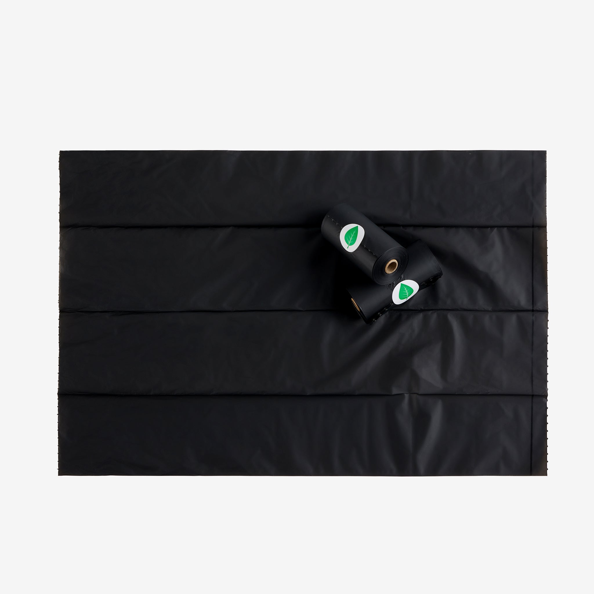 Dog waste bag refill rolls arranged for daily walking routines.