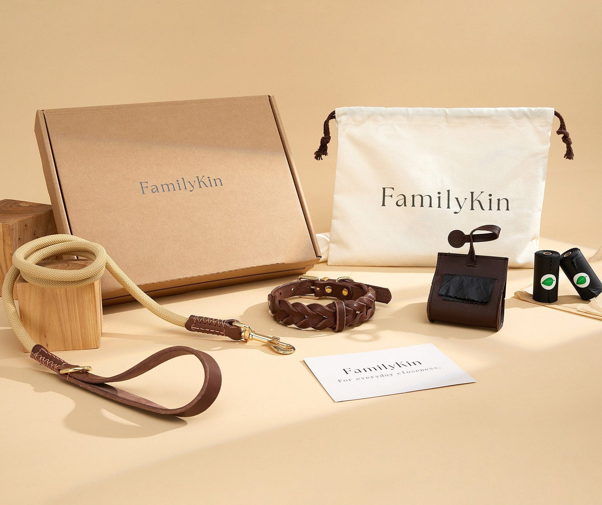 Dog collar and leash set arranged with waste bag holder and refill rolls