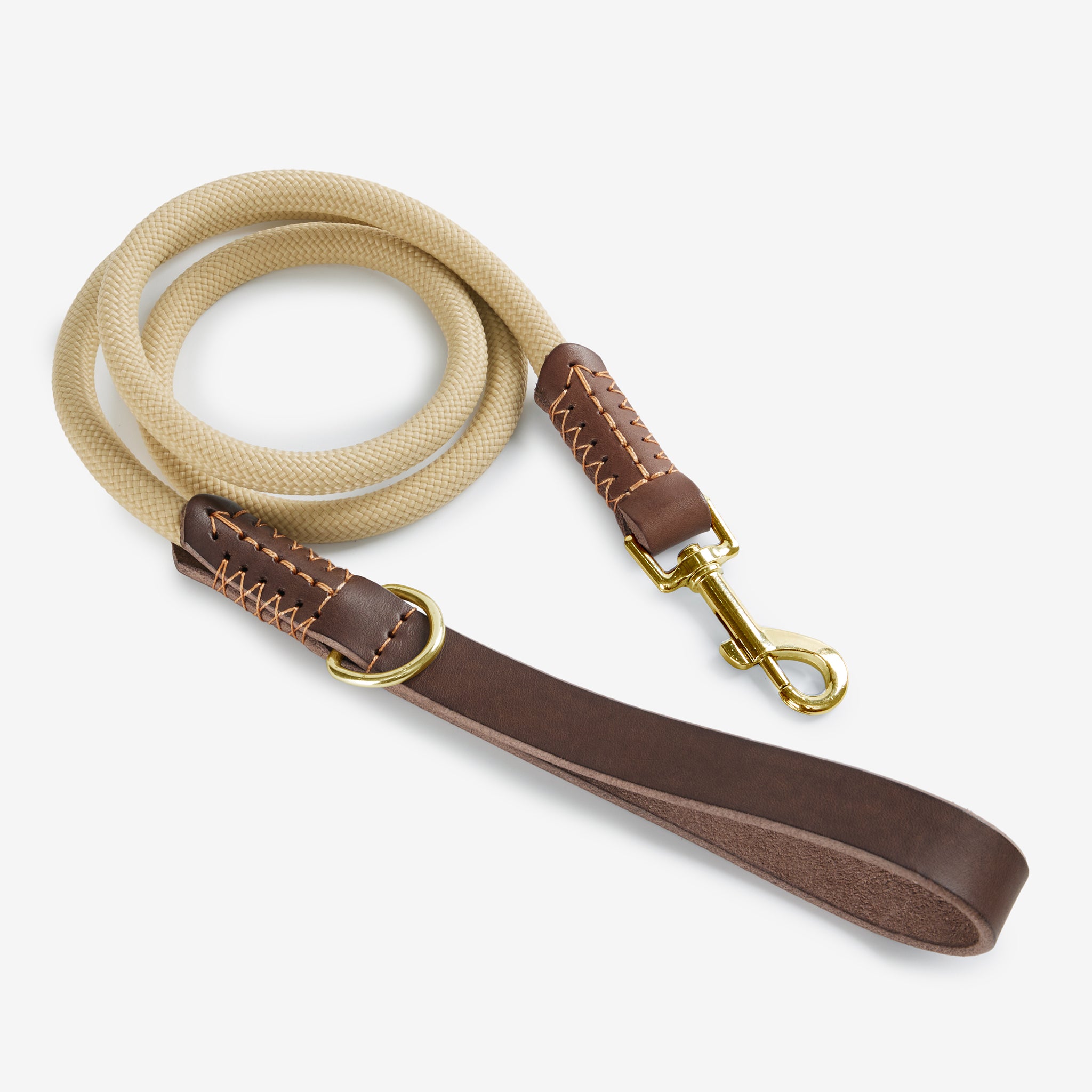 Rope and leather dog leash with handle, clasp, and leather trim details.