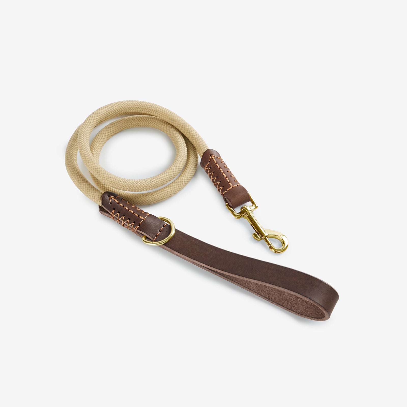 Rope and leather dog leash with handle, clasp, and leather trim details.